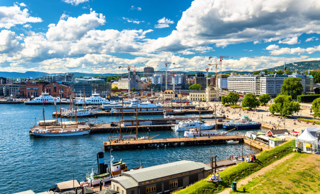 Consejos de Oslo: el consejo valentísimo sobre la ciudad en la haber noruega + planisferio