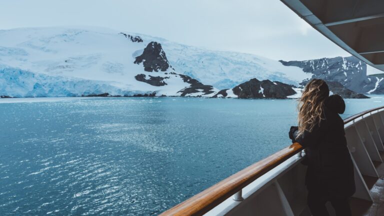 Antarctica,Cruise,Passenger,Views,Glacier.,Beautiful,Girl,Hair,Blowing,In