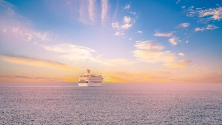 Majestic,Cruise,Ship,Sailing,At,Sunset,On,Open,Sea.