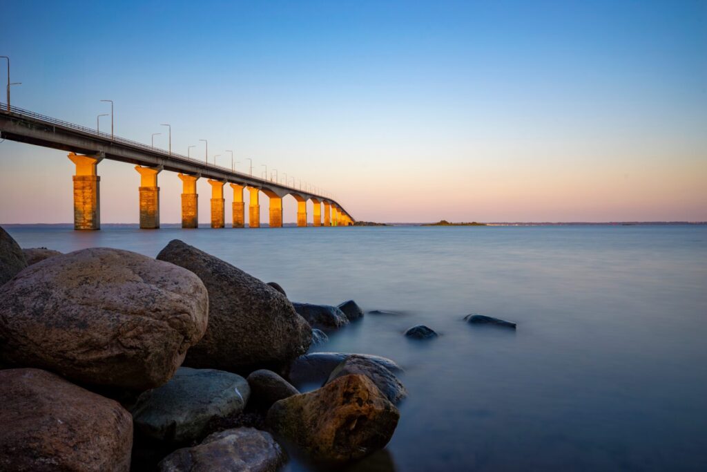 ÷land,Bridge,In,Sweden,At,Romantic,Sunset,With,Rocks,In